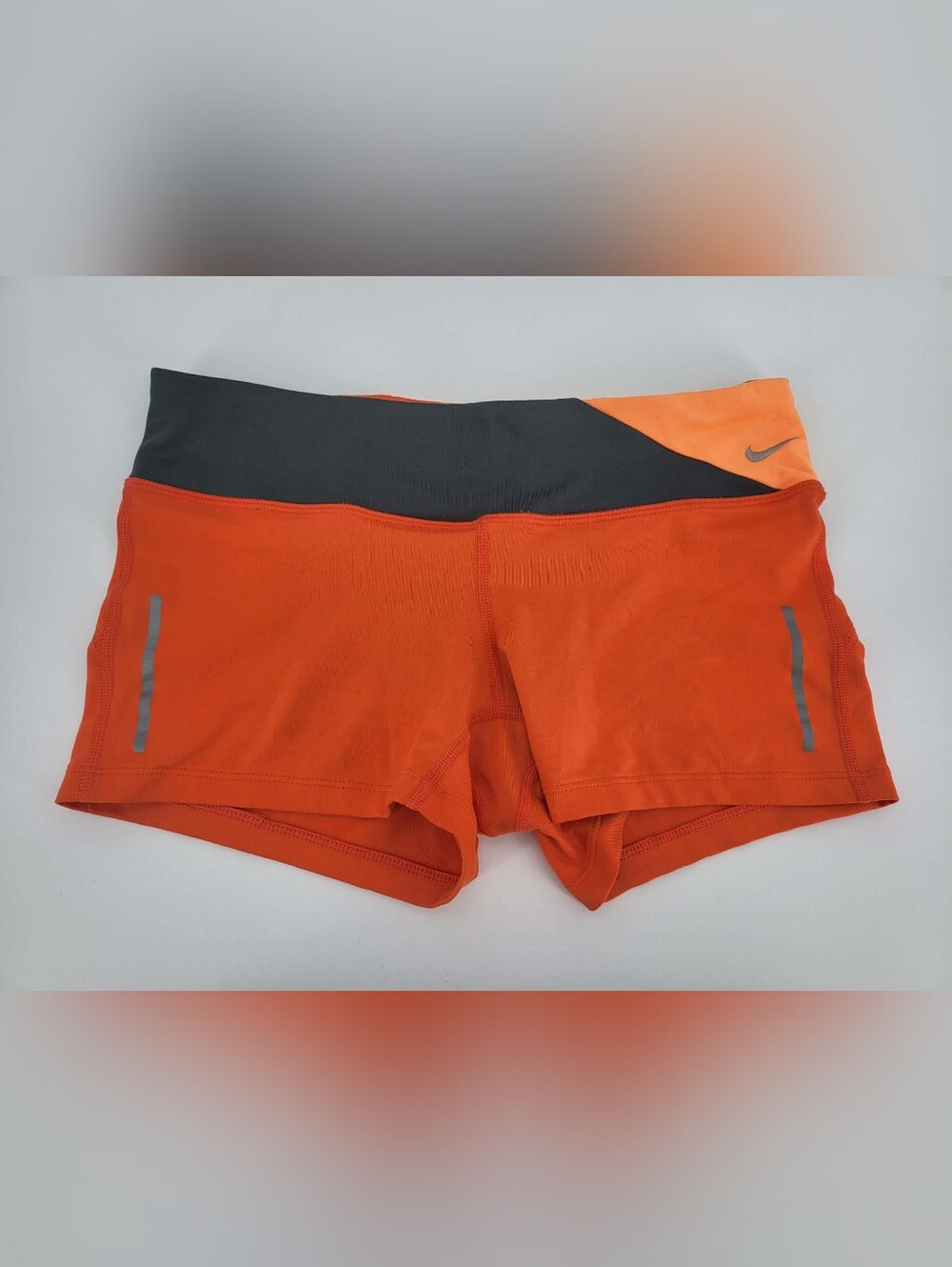 Nike Women's Orange Bike Shorts with Dark Gray Waistband